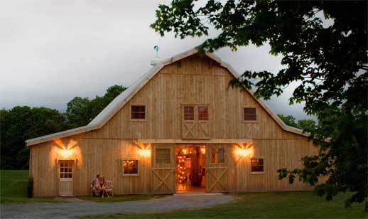 The Oak Hill barn glowing at dusk
